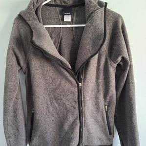 Gray warm-up runner's jacket from Reebok. Size S.